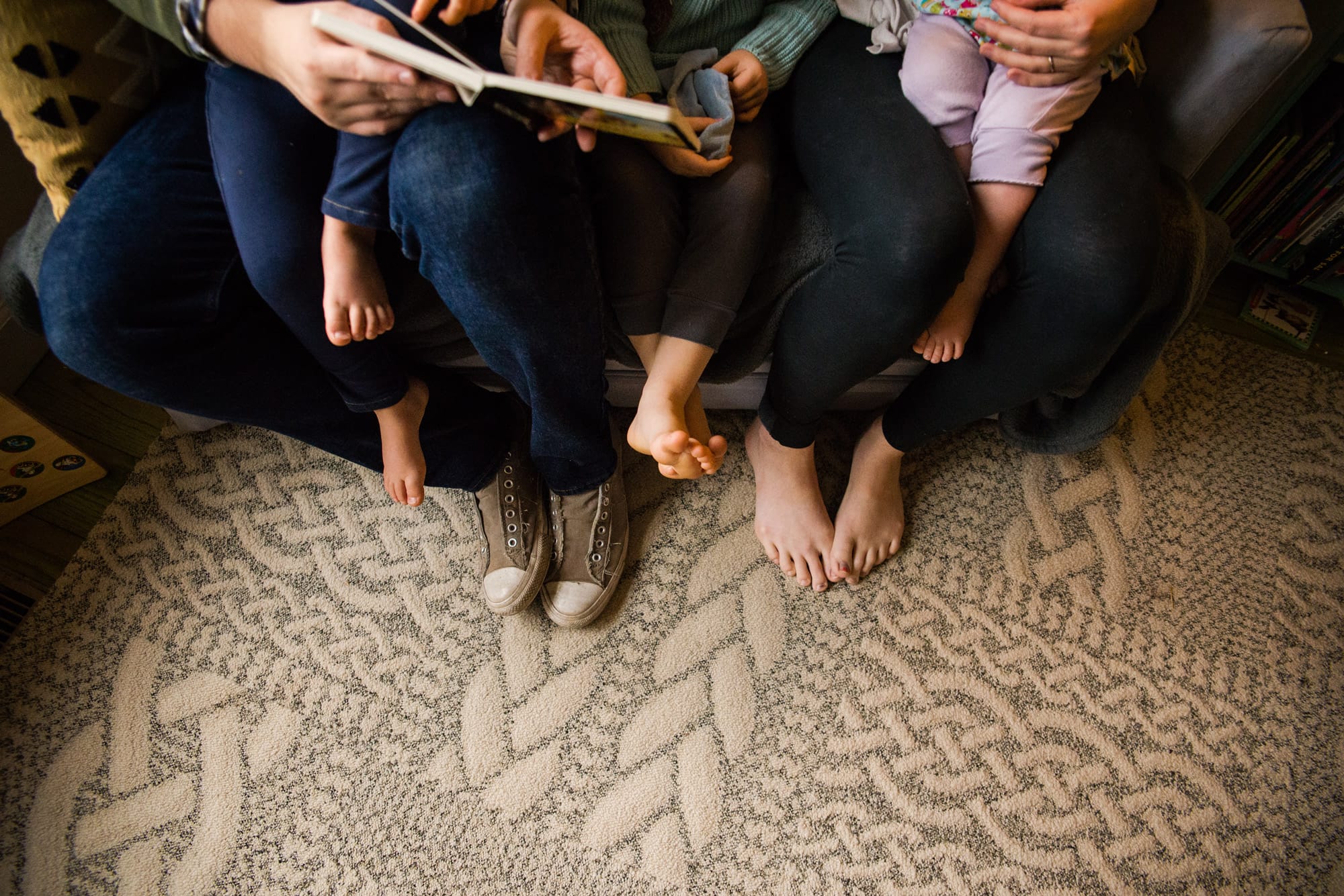 Family Photographer Toledo family cuddled together photo by Cynthia Dawson Photography