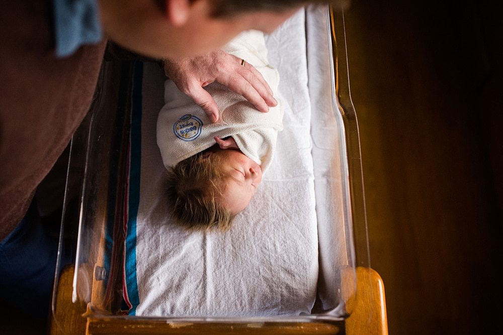 Flower Hospital Newborn in bassinet photo by Cynthia Dawson Photography