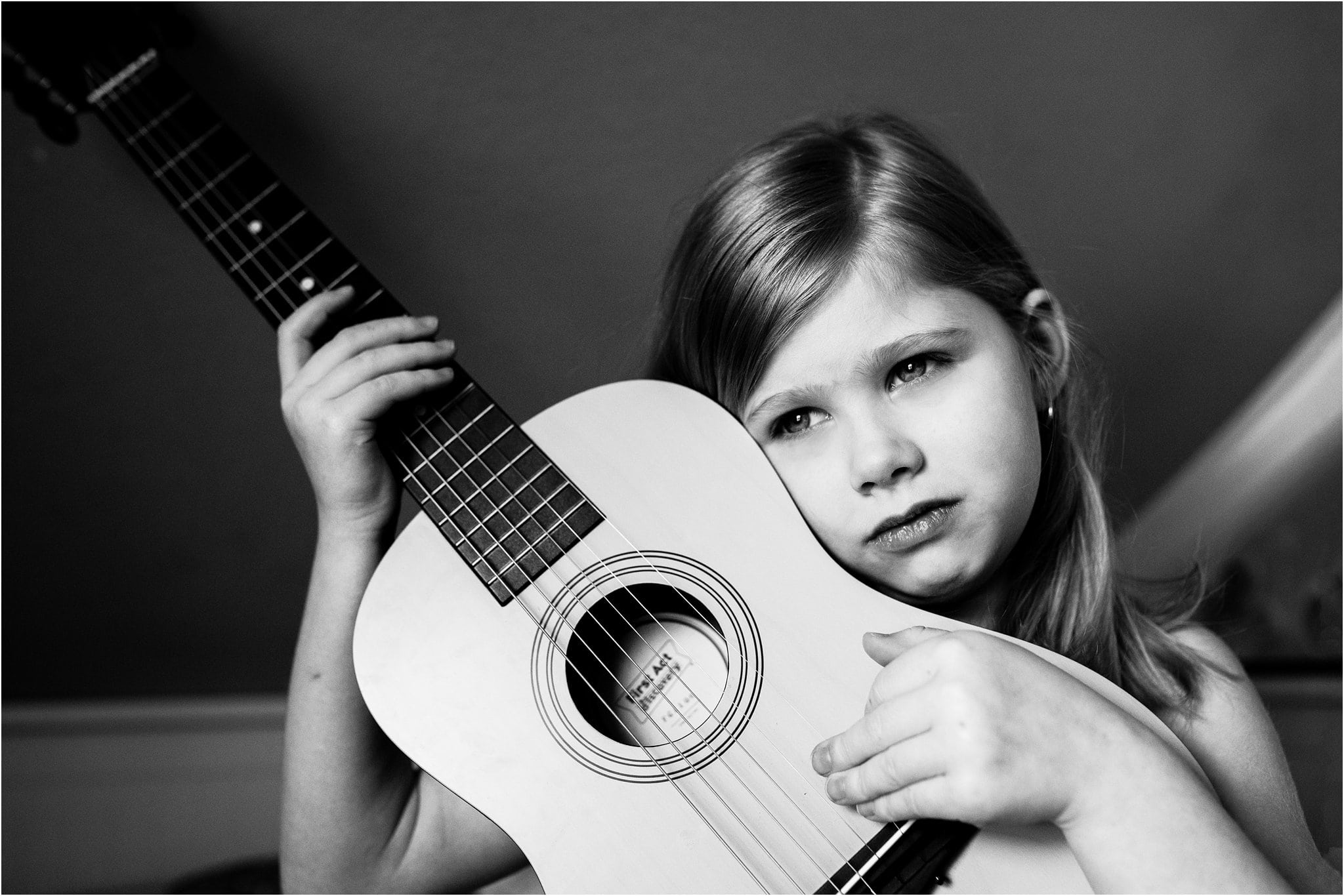 close up of girl with gutair 