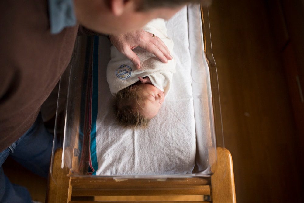 Labor Delivery St. Charles Hospital Newborn in bassinet photo by Cynthia Dawson Photography 