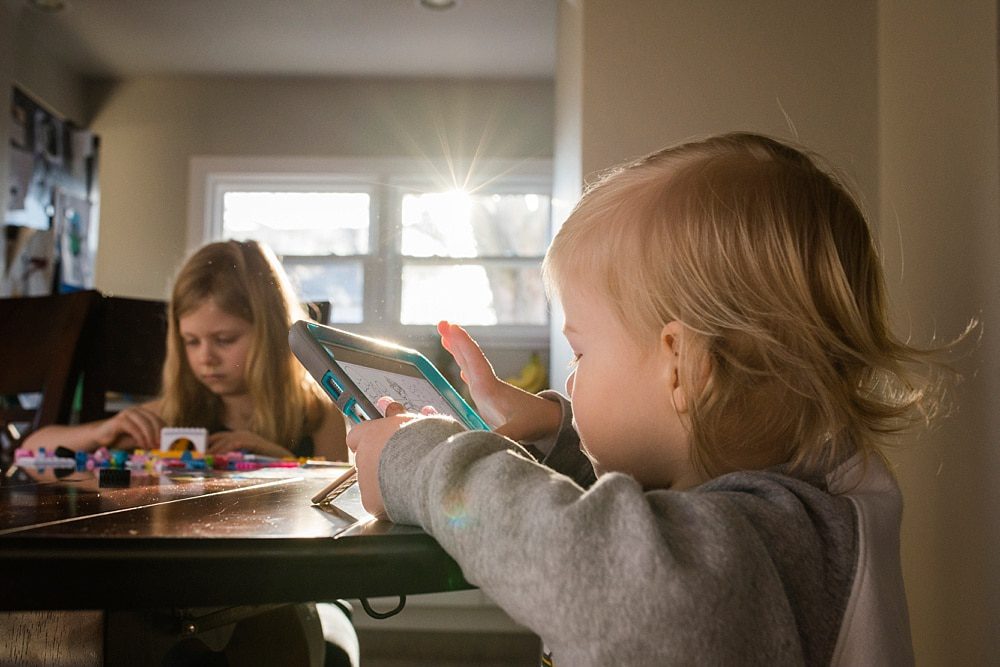 Findlay Ohio Photographer boy on iPad photo by cynthia dawson photography 