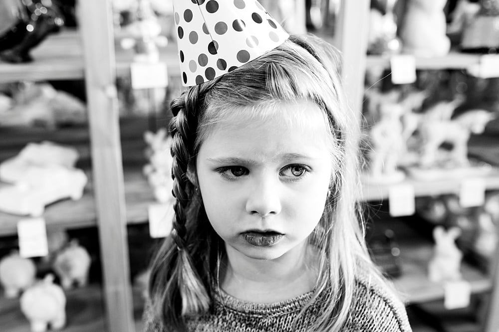 Event Photographer Toledo Ohio girl in party hat photo by Cynthia Dawson Photography 