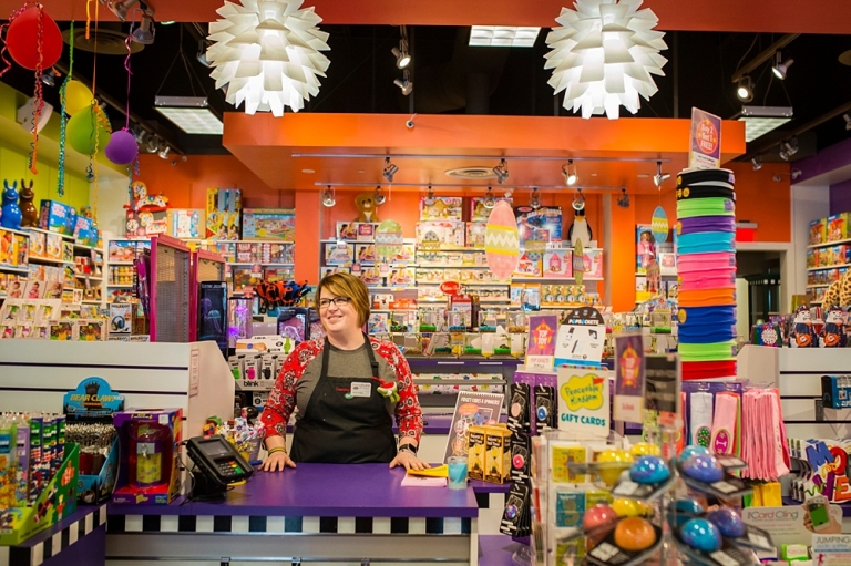 Learning Express Toys Maumee manager photo by Cynthia Dawson Photography 