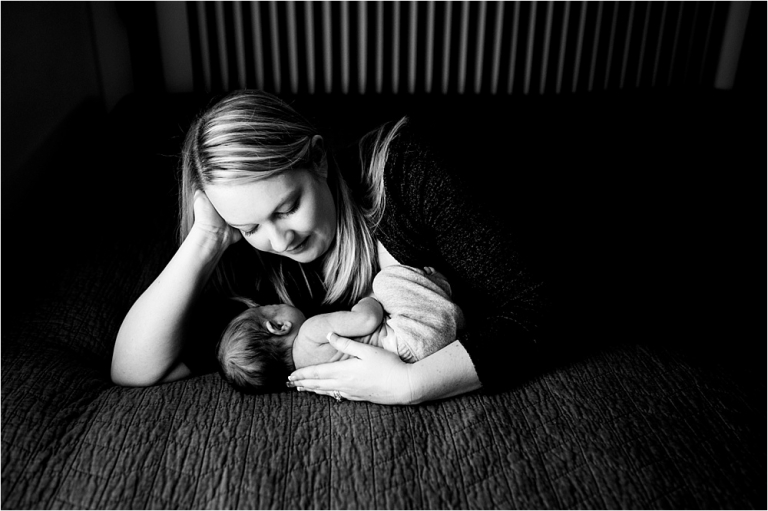 Toledo OH Newborn Photographer mother and newborn cuddling photo by Cynthia Dawson Photography