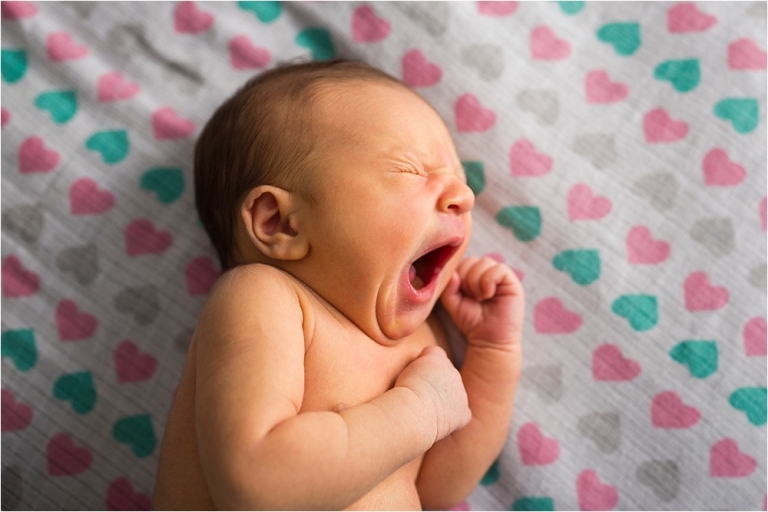 Toledo Oh Newborn Photographer newborn girl yawning photo by Cynthia Dawson Photography
