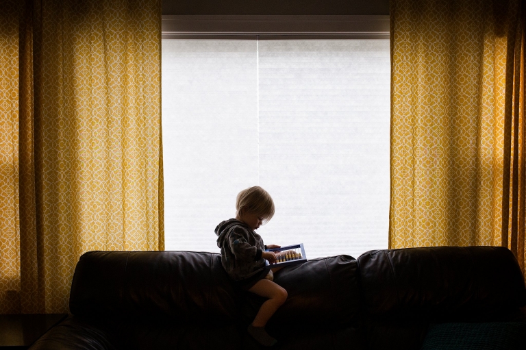 Lifestyle Family Photography Toledo little boy sitting on couch photo by Cynthia Dawson pHotography