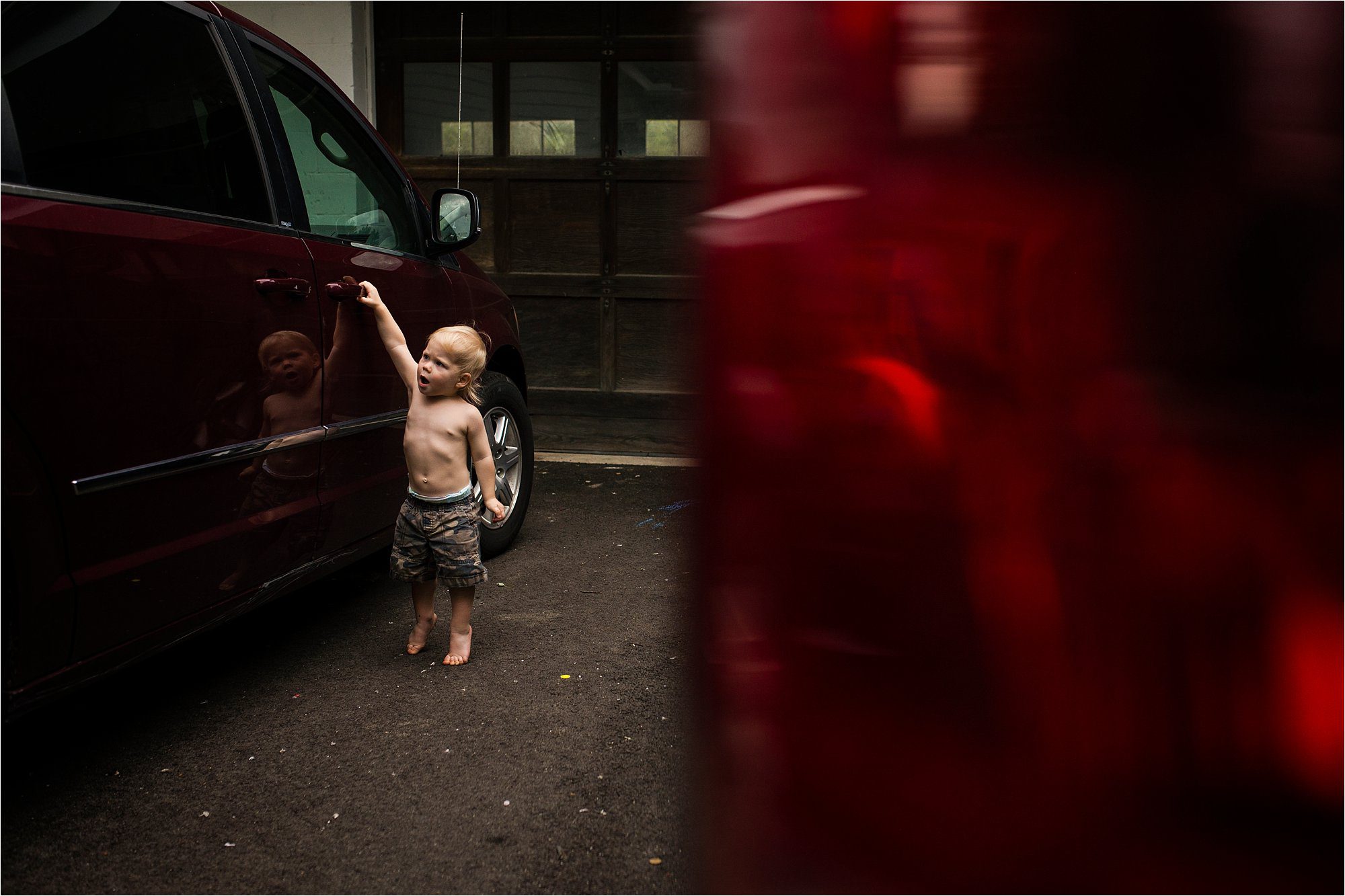 Toledo Lifestyle Photos kid trying to get in the car photo by Cynthia Dawson Photography