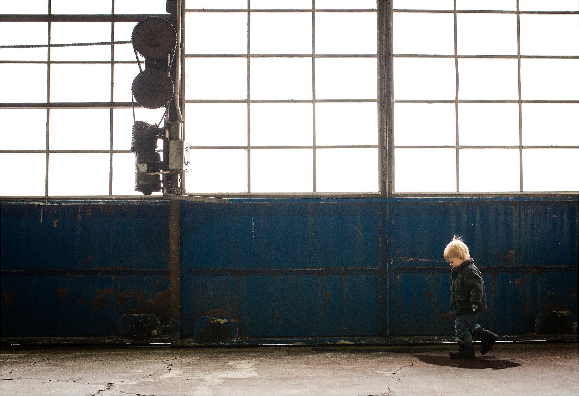 7 Ways to Use the Environment Around You to Frame Your Subject boy walking photo by Cynthia Dawson Photography 