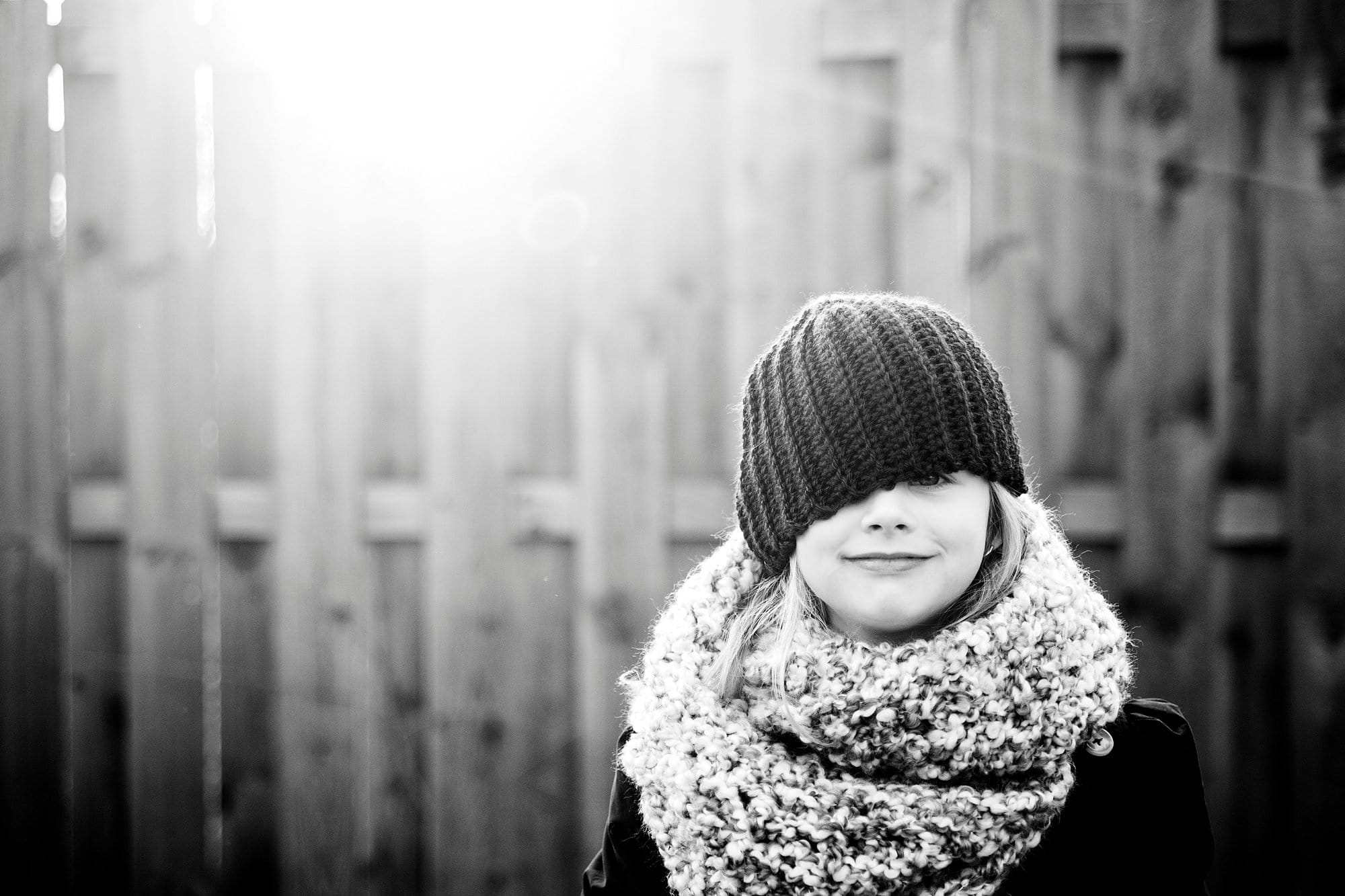 Downtown Perrysburg girl by fence photo by cynthia dawson photography 