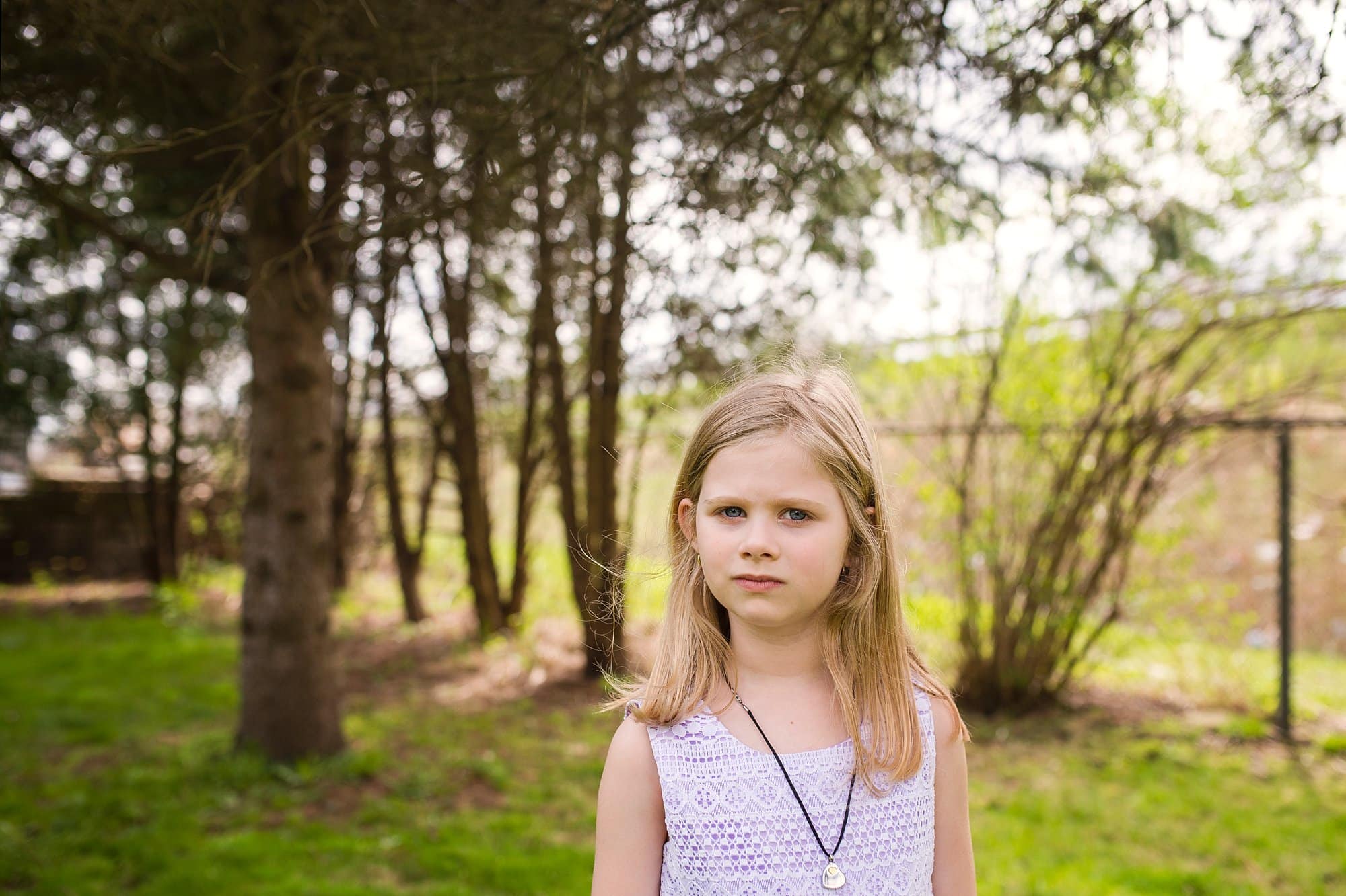 Child Photographer Perrysburg girl looking at camera photo by Cynthia Dawson Photography