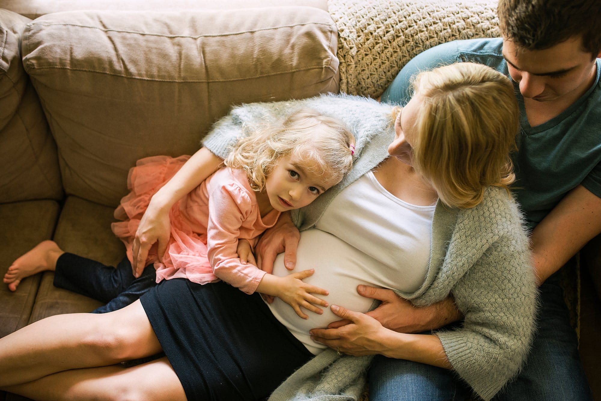 Toledo Maternity Photography toddler loving on mom photo by Cynthia Dawson Photography