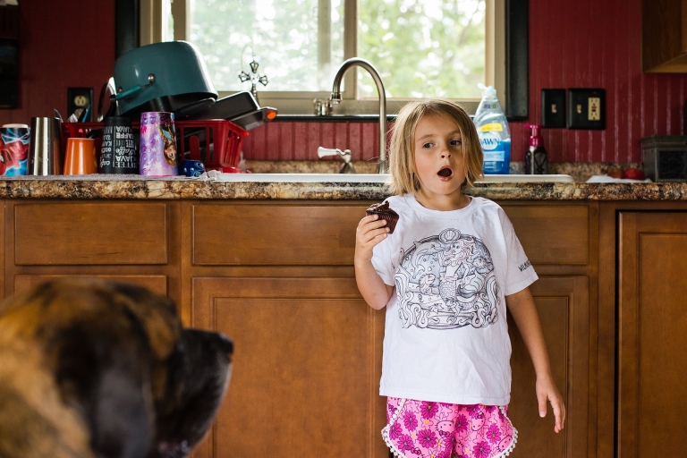 Toledo Ohio Family Photographer Review girl eating cupcake photo by Cynthia Dawson Photography