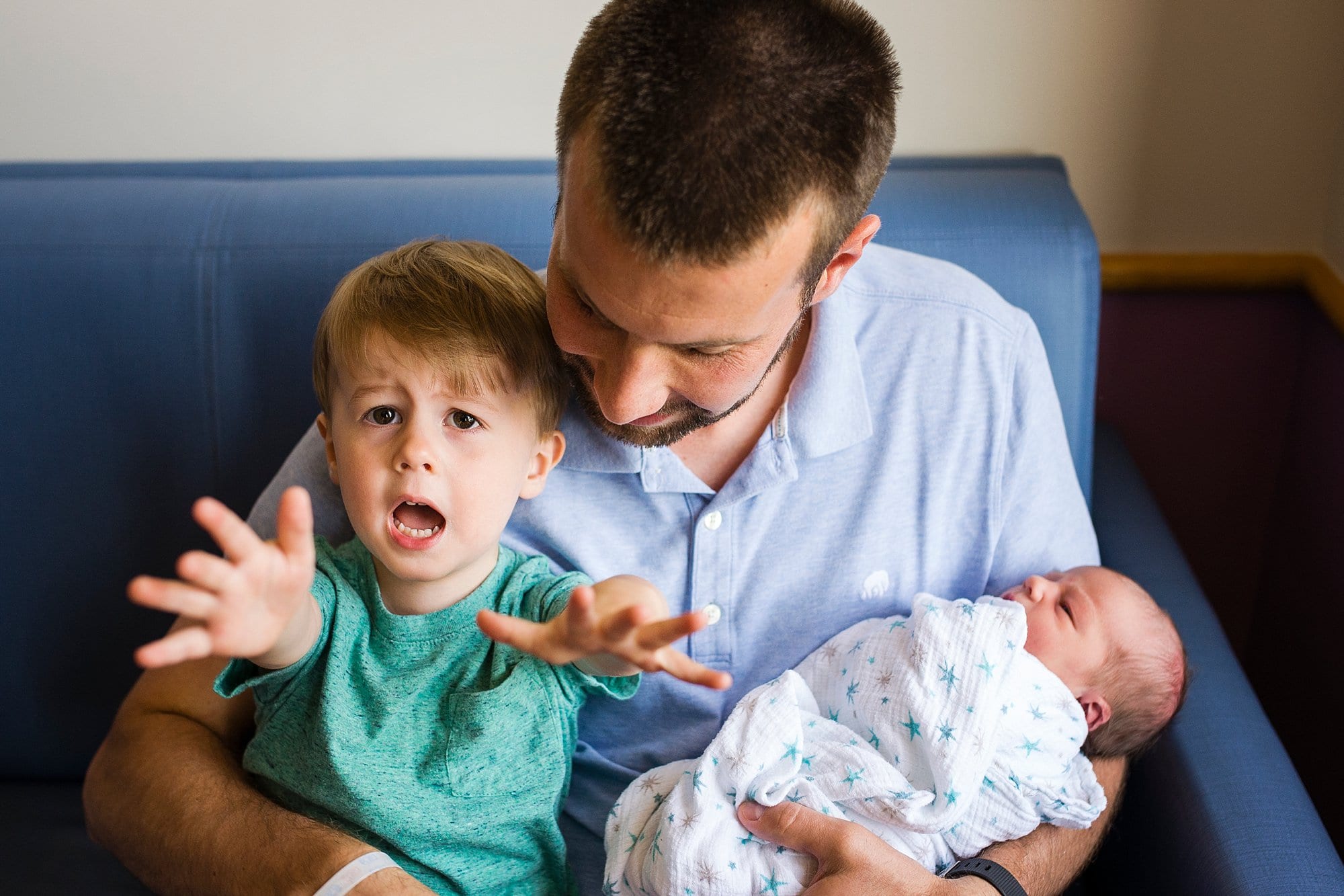 Toledo Newborn Photography dad and two sons photo by Cynthia Dawson Photography