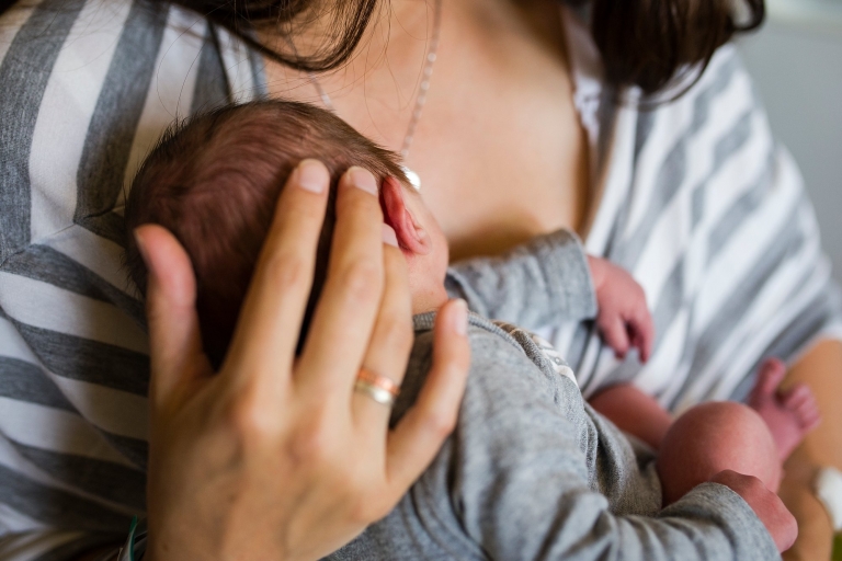 Toledo Hospital Baby Photos details of mother holding newborn photo by Cynthia Dawson Photography