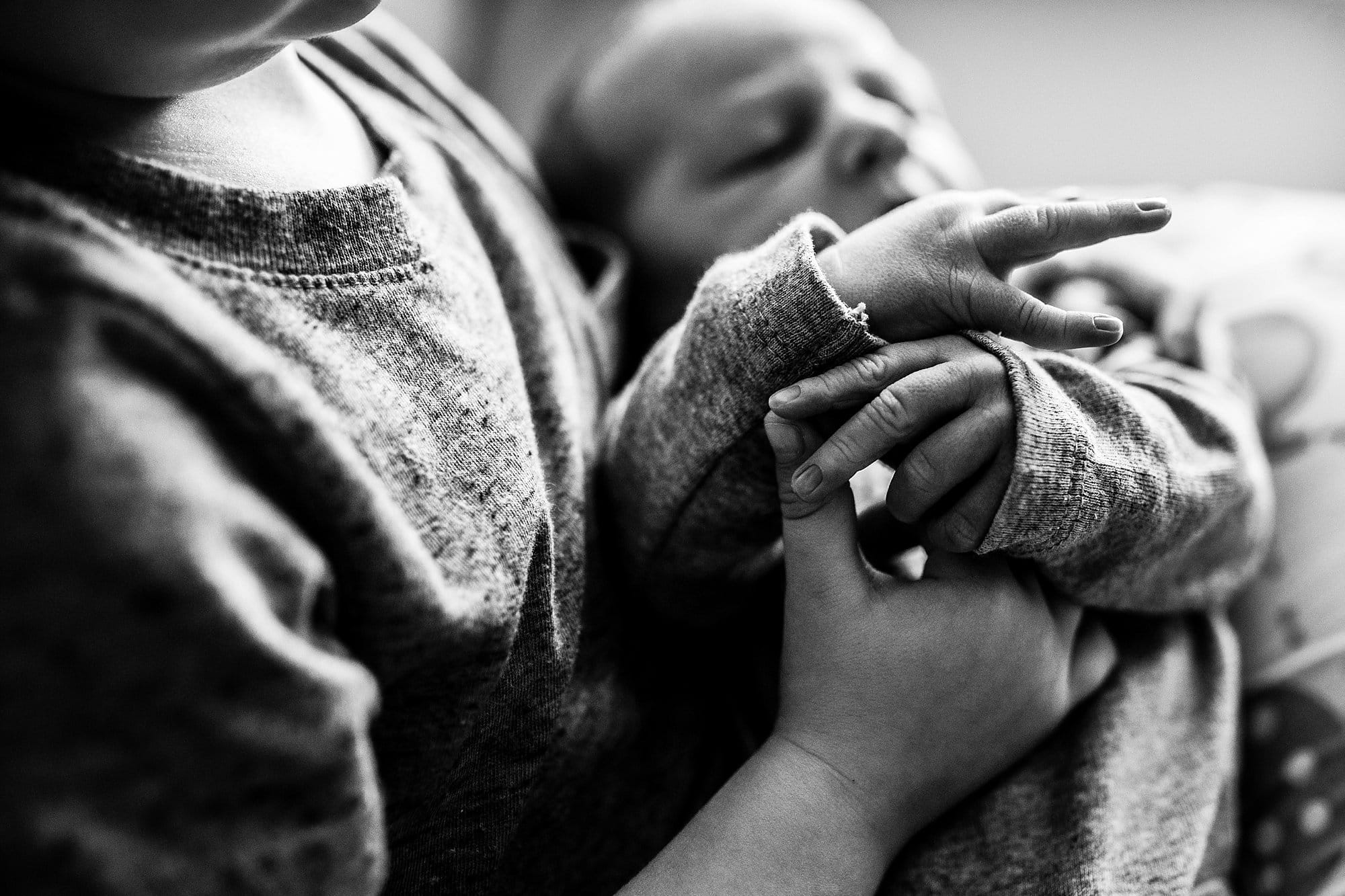 Toledo Hospital Baby Photos brothers hands photo by Cynthia Dawson Photography