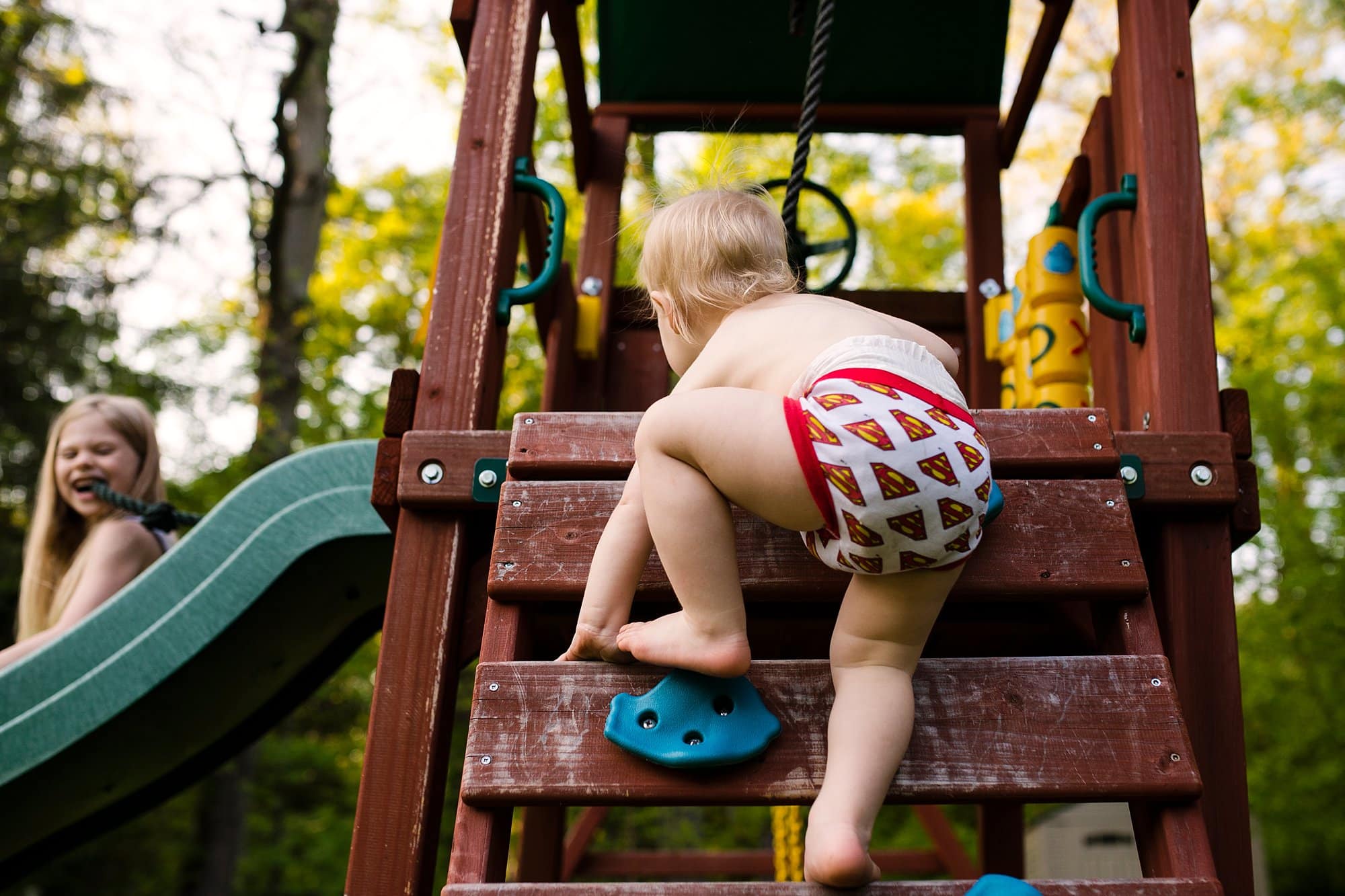 Toledo Ohio Lifestyle Photographer boy climbing photo by Cynthia Dawson Photography