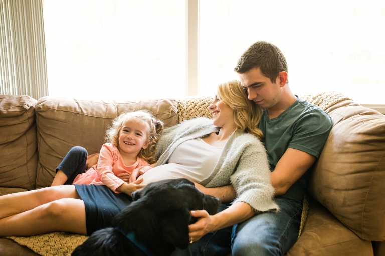 Lifestyle Family Session Toledo Ohio family cuddling on couch photo by Cynthia Dawson Photography