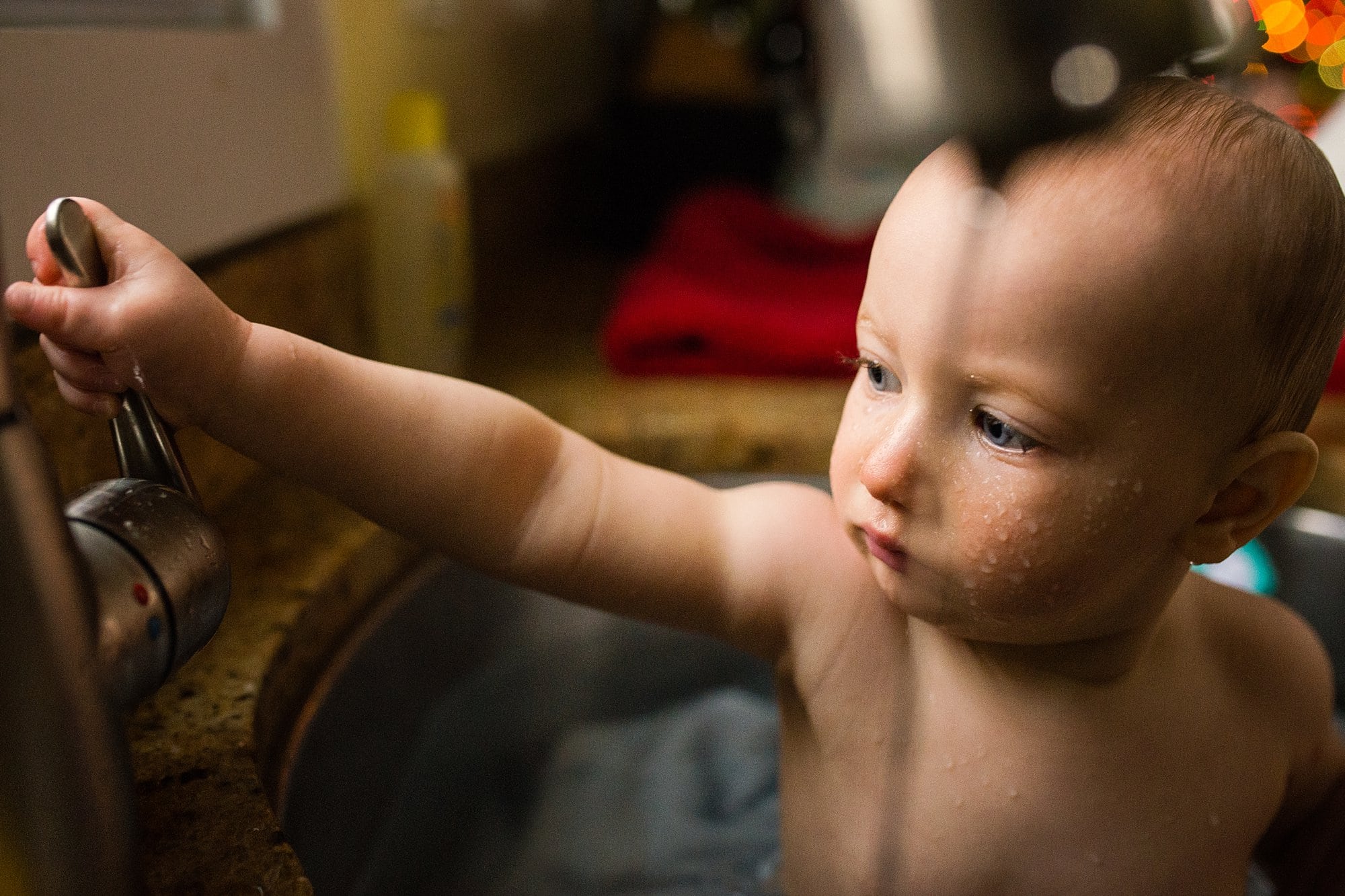 Lifestyle Family Session Toledo Ohio boy in sink bath photo by Cynthia Dawson Photography