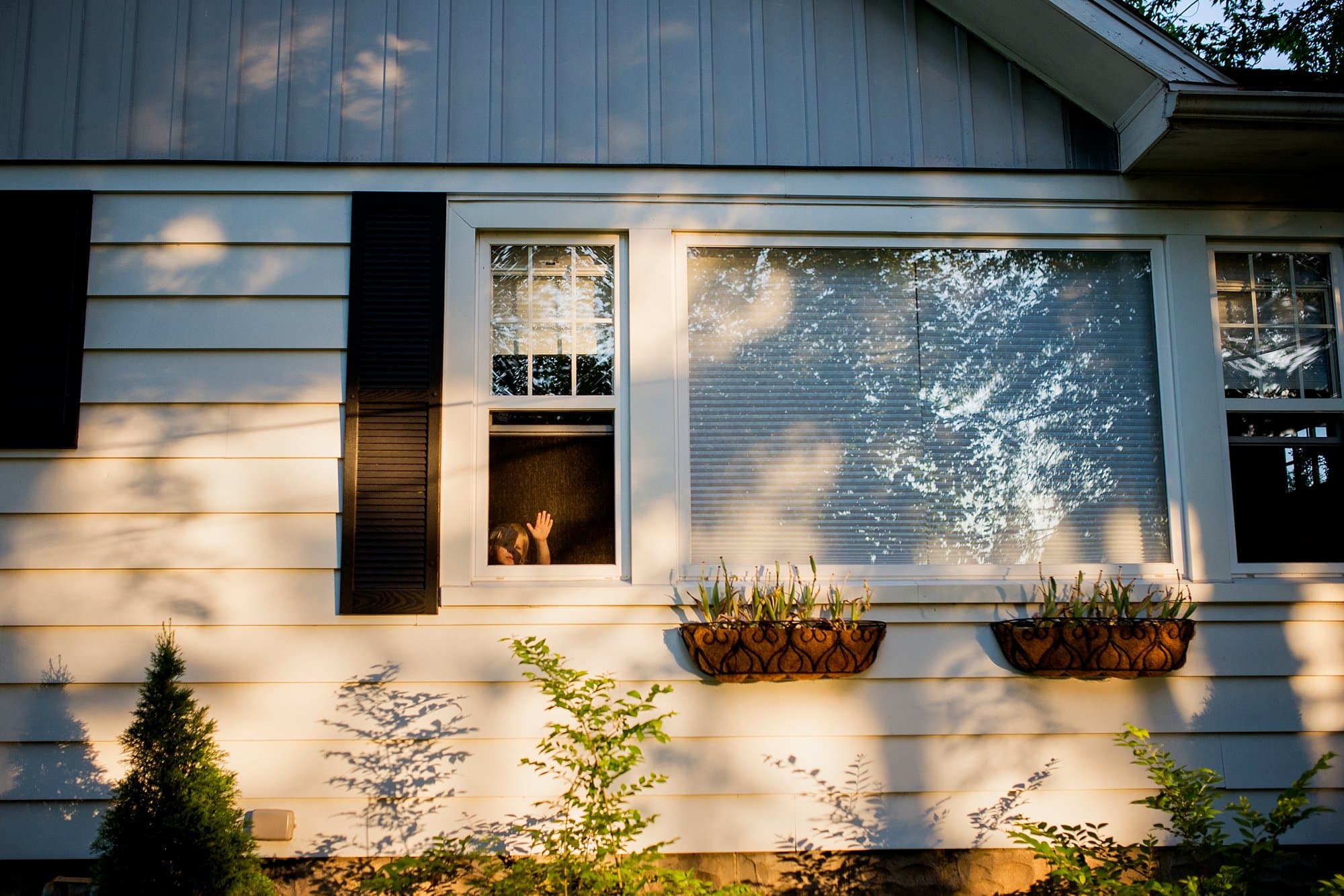 Toledo Ohio Family Photo Session boy in window photo by Cynthia Dawson Photography