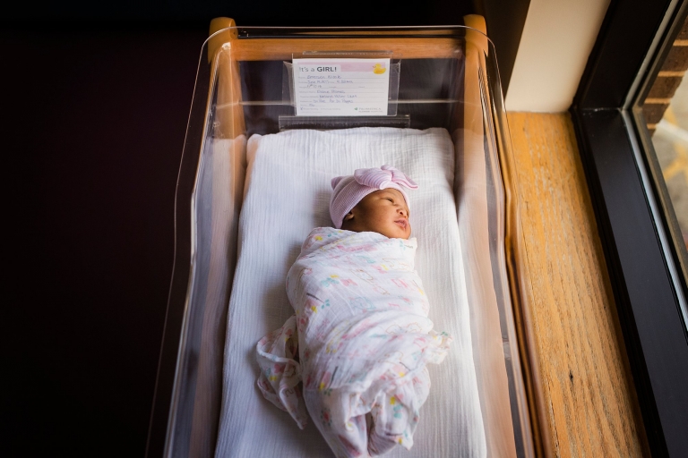 Toledo Ohio Newborn Hospital Photos newborn girl in bassinet photo by Cynthia Dawson Photography