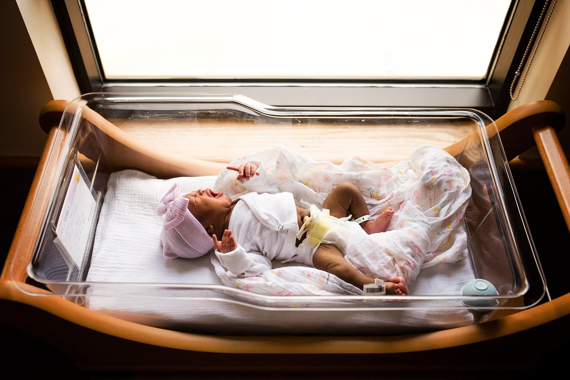 Toledo Ohio Newborn Hospital Photos newborn in bassinet photo by Cynthia Dawson Photography