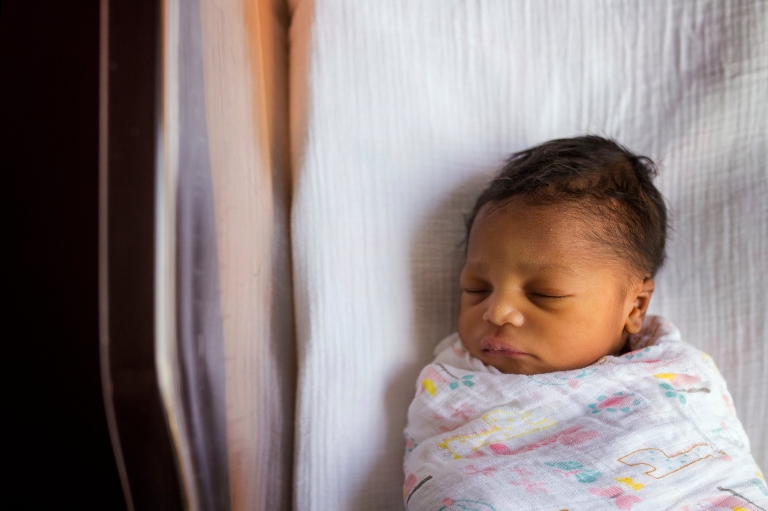 Toledo Ohio Newborn Hospital Photos newborn in bassinet photo by Cynthia Dawson Photography