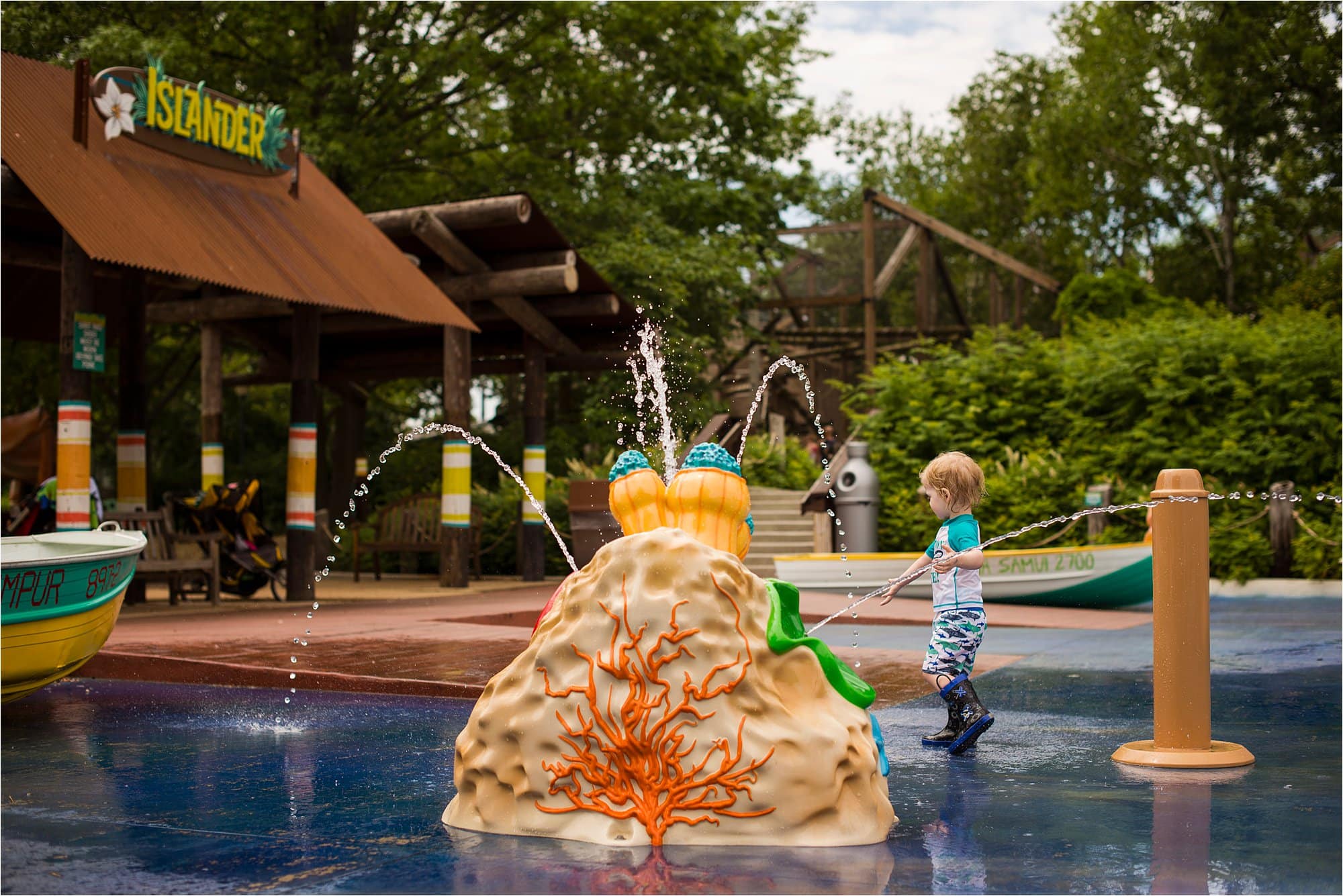 Toledo Zoo Splash Pad boy in water photo by Cynthia Dawson Photography