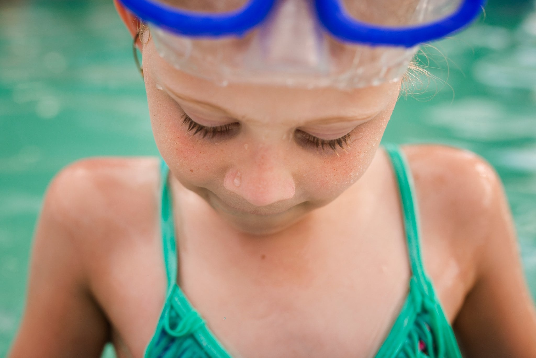 Northwest Ohio Lifestyle Photographer girl in pool photo by Cynthia Dawson Photography 