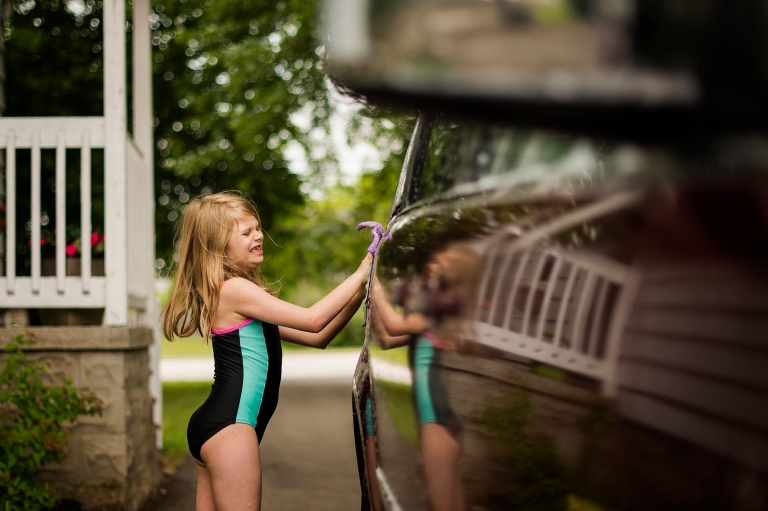 Northwest Ohio Lifestyle Photographer girl washing car photo by Cynthia Dawson Photography
