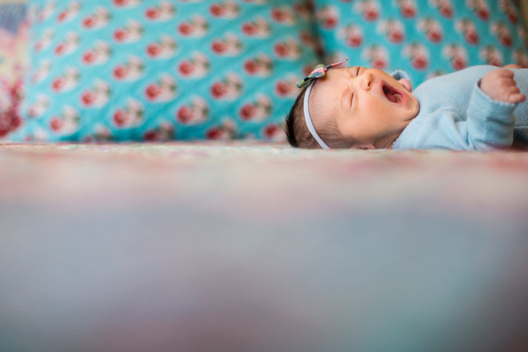 Toledo Ohio Newborn Lifestyle Photography newborn girl yawning photo by Cynthia Dawson Photography