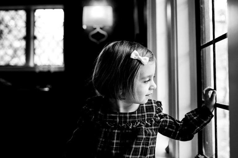 Toledo Ohio Family Photographer toddler looking out window photo by Cynthia Dawson photography