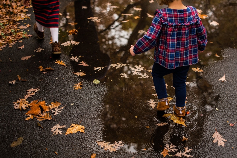 Toledo Ohio Family Photographer toddler walking in leaves photo by Cynthia Dawson photography