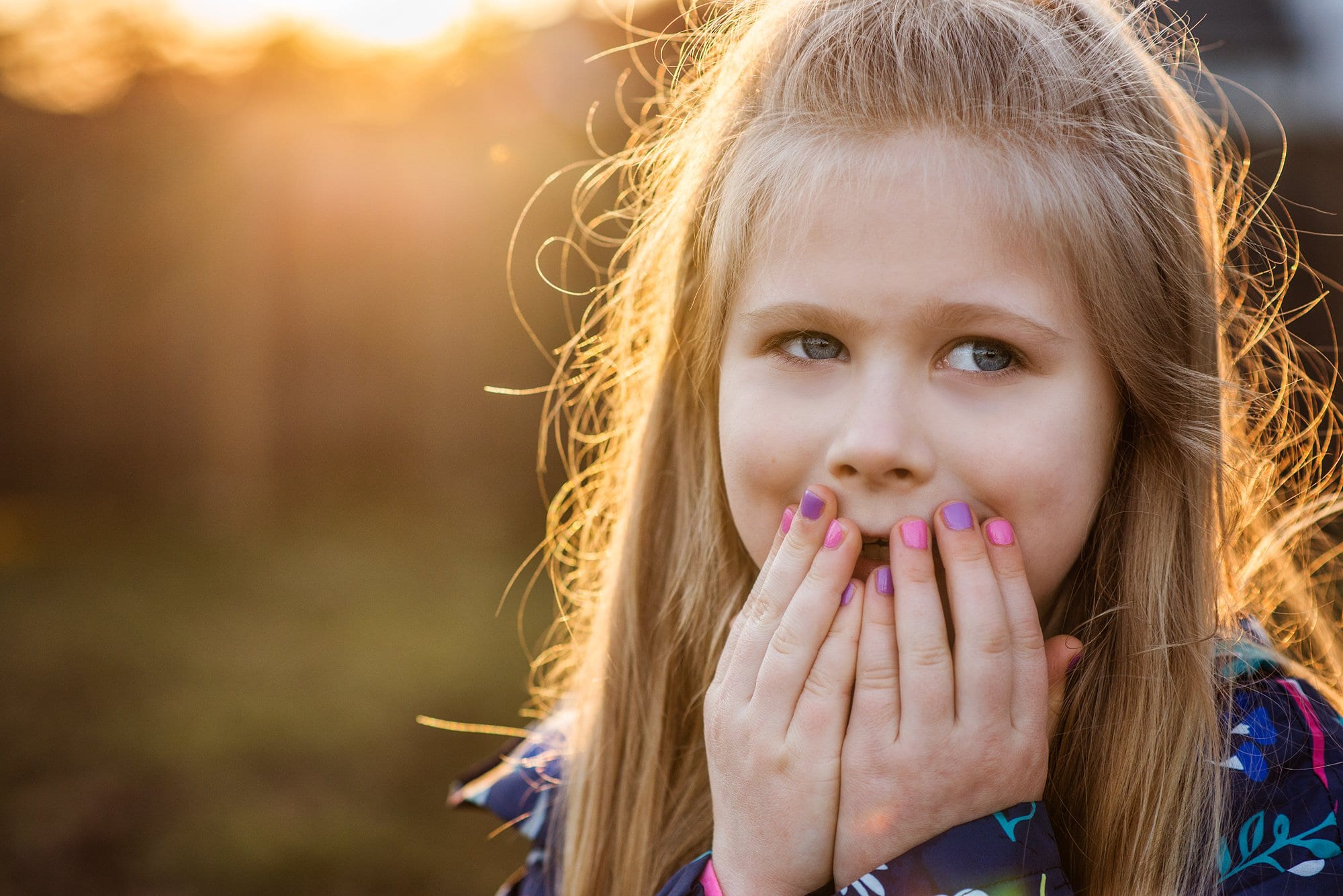 Toledo Child Photographer little girl covering mouth photo by Cynthia Dawson Photography