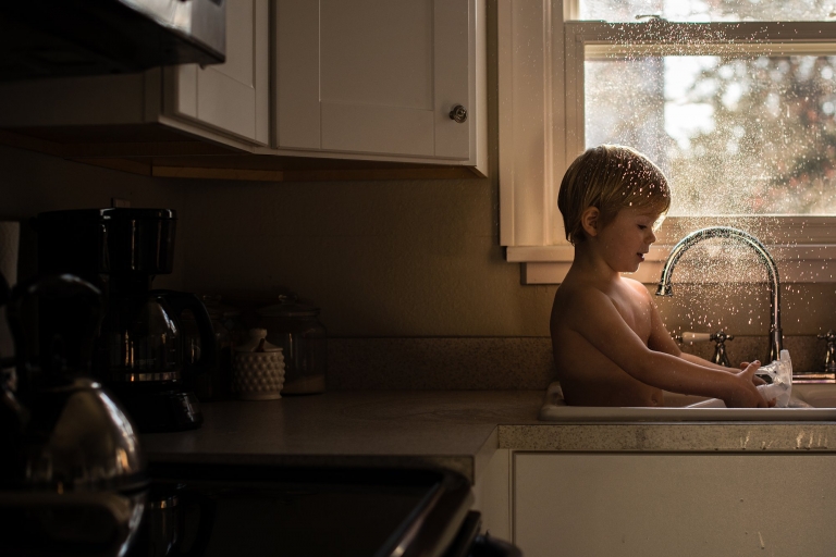 Lifestyle Photographer Toledo Ohio toddler splashing water photo by cynthia dawson photography
