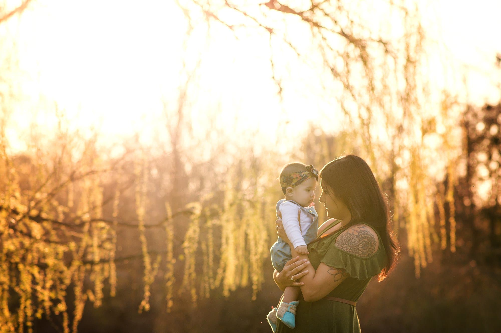 Toledo Lifestyle Family Photographer mom holding daughter photo by cynthia dawson photography