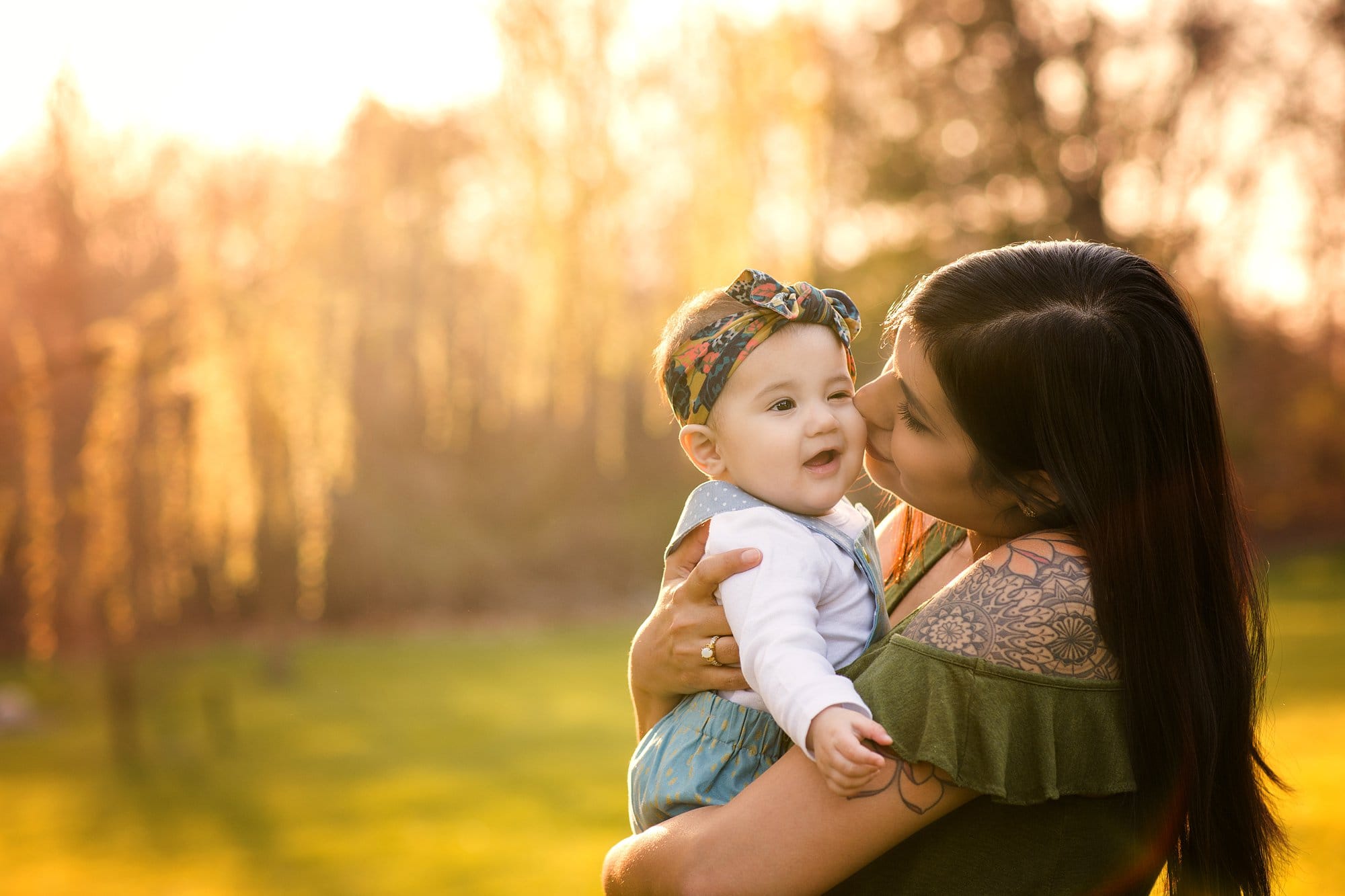 Toledo Lifestyle Family Photographer mom kissing daughter photo by cynthia dawson photography