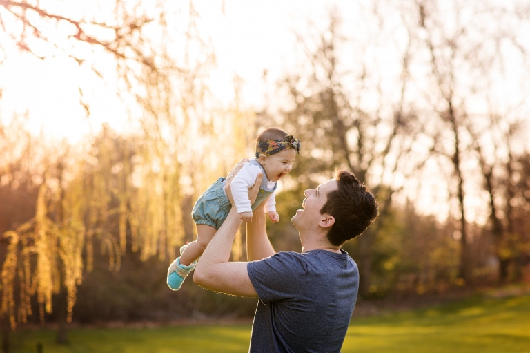 Toledo Lifestyle Family Photographer dad playing with baby photo by cynthia dawson photography