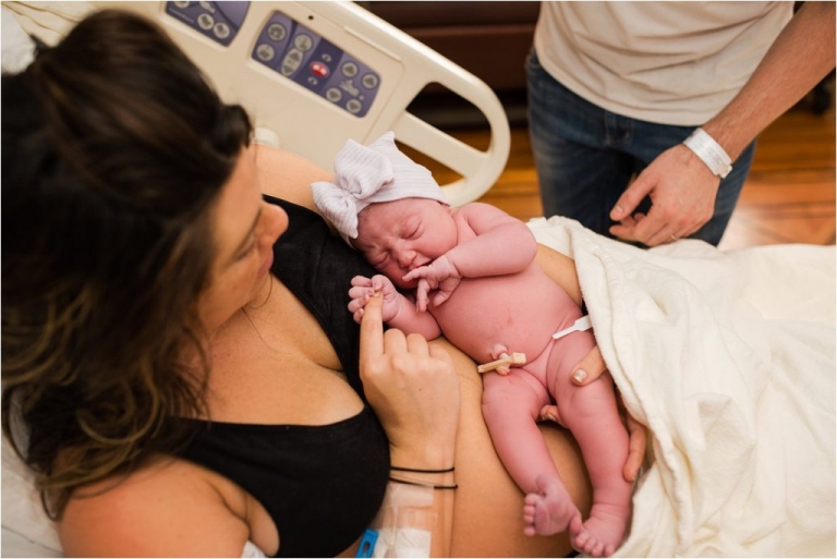 Toledo Ohio Birth Photographer mother holding newborn photo by Cynthia Dawson Photography