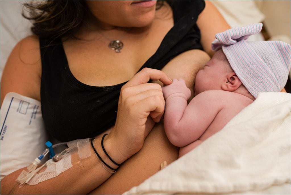 Toledo Ohio Birth Photographer mother holding newborn photo by Cynthia Dawson Photography