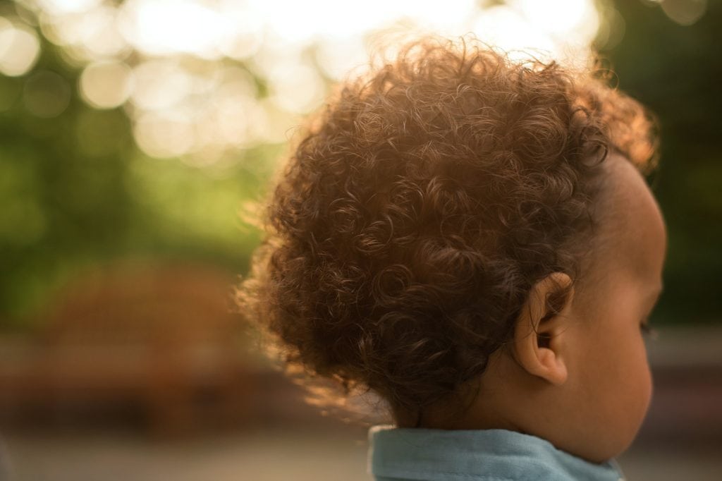 Family Photographer Perrysburg Ohio close up of toddler boy curly hair photo by Cynthia Dawson Photography