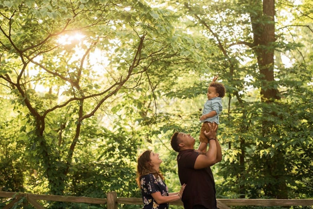 Family Photographer Perrysburg Ohio family of three looking at each other photo by Cynthia Dawson Photography