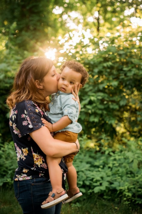 Family Photographer Perrysburg Ohio mom kissing son photo by Cynthia Dawson Photography