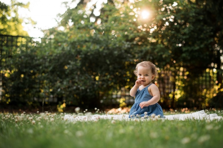 Toledo Ohio Child Photographer baby girl smiling towards camera photo by Cynthia Dawson Photography