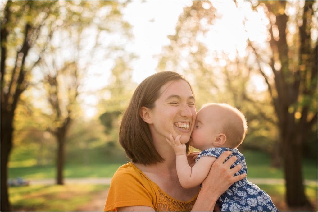 Northwest Ohio Family Lifestyle Photographer baby kissing mother photo by Cynthia Dawson Photography