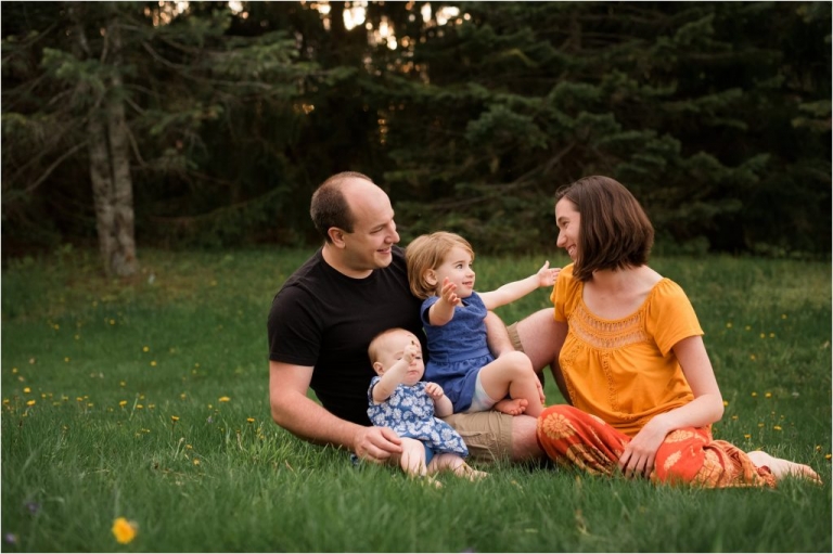 Northwest Ohio Family Lifestyle Photographer family of four embracing photo by Cynthia Dawson Photography