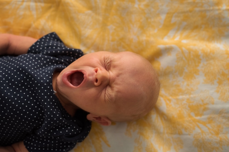 Newborn Photos in Toledo Ohio newborn yawning photo by Cynthia Dawson Photography