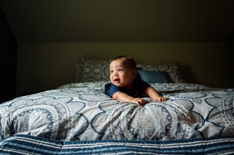 Toledo Baby Photographer baby laying on bed photo by Cynthia Dawson Photography