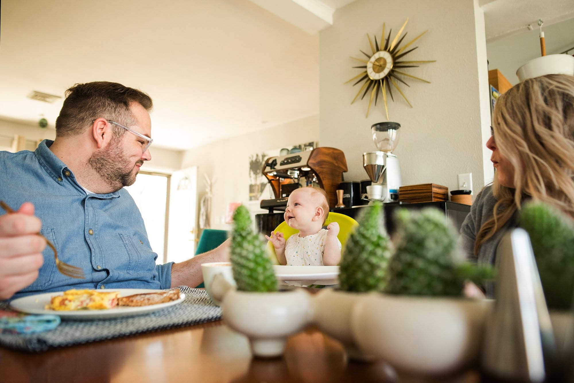 Lifestyle Photographer in Perrysburg Ohio baby smiling at dad photo by Cynthia Dawson Photography 