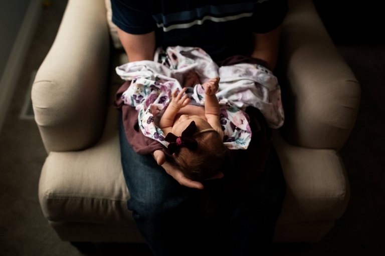 Newborn Lifestyle Photography in Perrysburg Ohio dad holding baby girl photo by Cynthia Dawson Photography