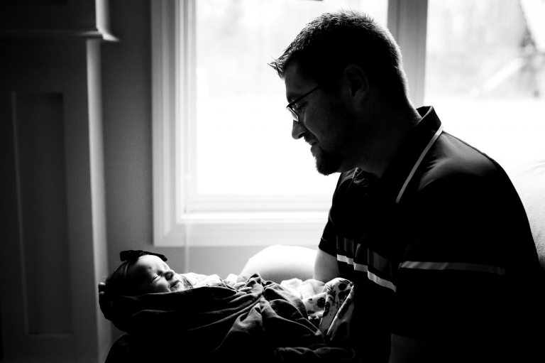 Prerrysburg Ohio Newborn Photographer mother holding baby photo by Cynthia Dawson Photography